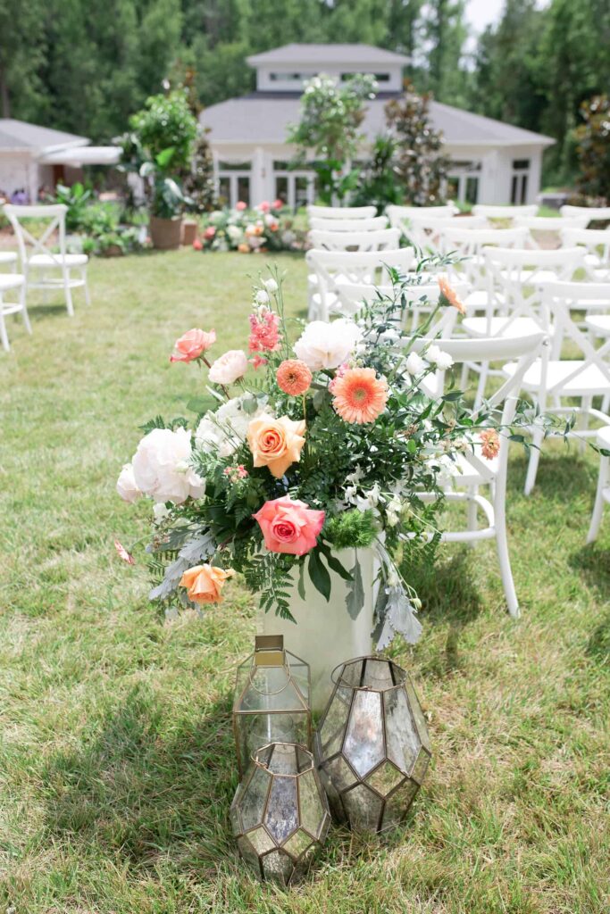 orange flower arrangement at a wedding ceremony at the Upchurch venue