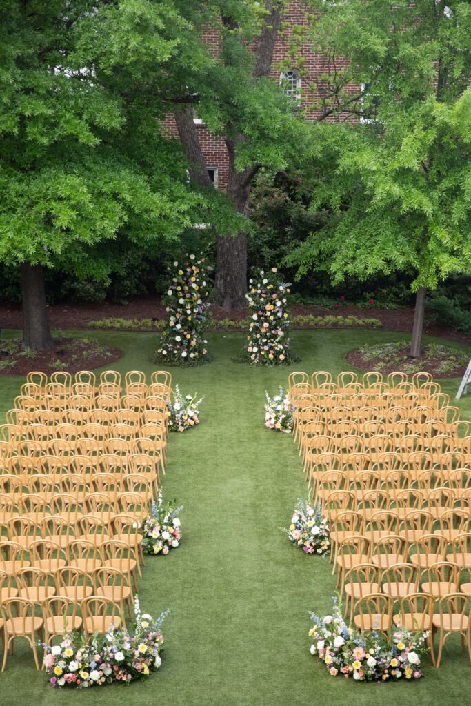 wedding ceremony setup at the main lawn downtown Raleigh wedding venue. Merrimon-Wynne House wedding ceremony setup in spring.