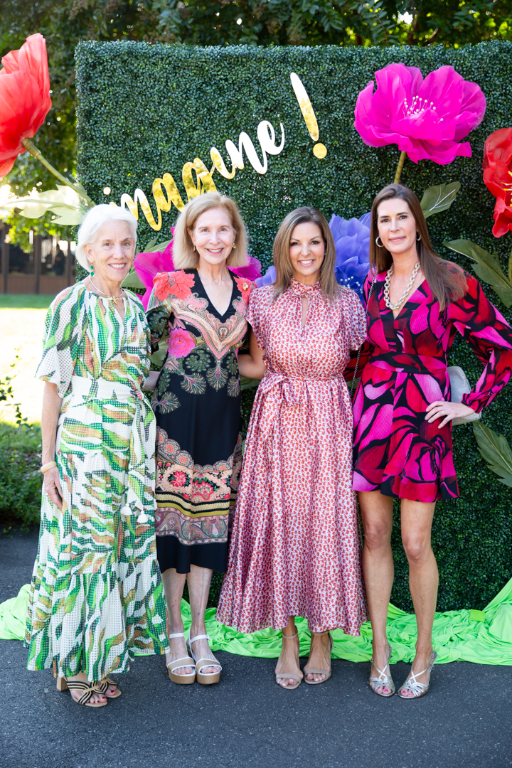 Gala guests posing for a photo. Pavilion at the Angus Barn Event Photographer.