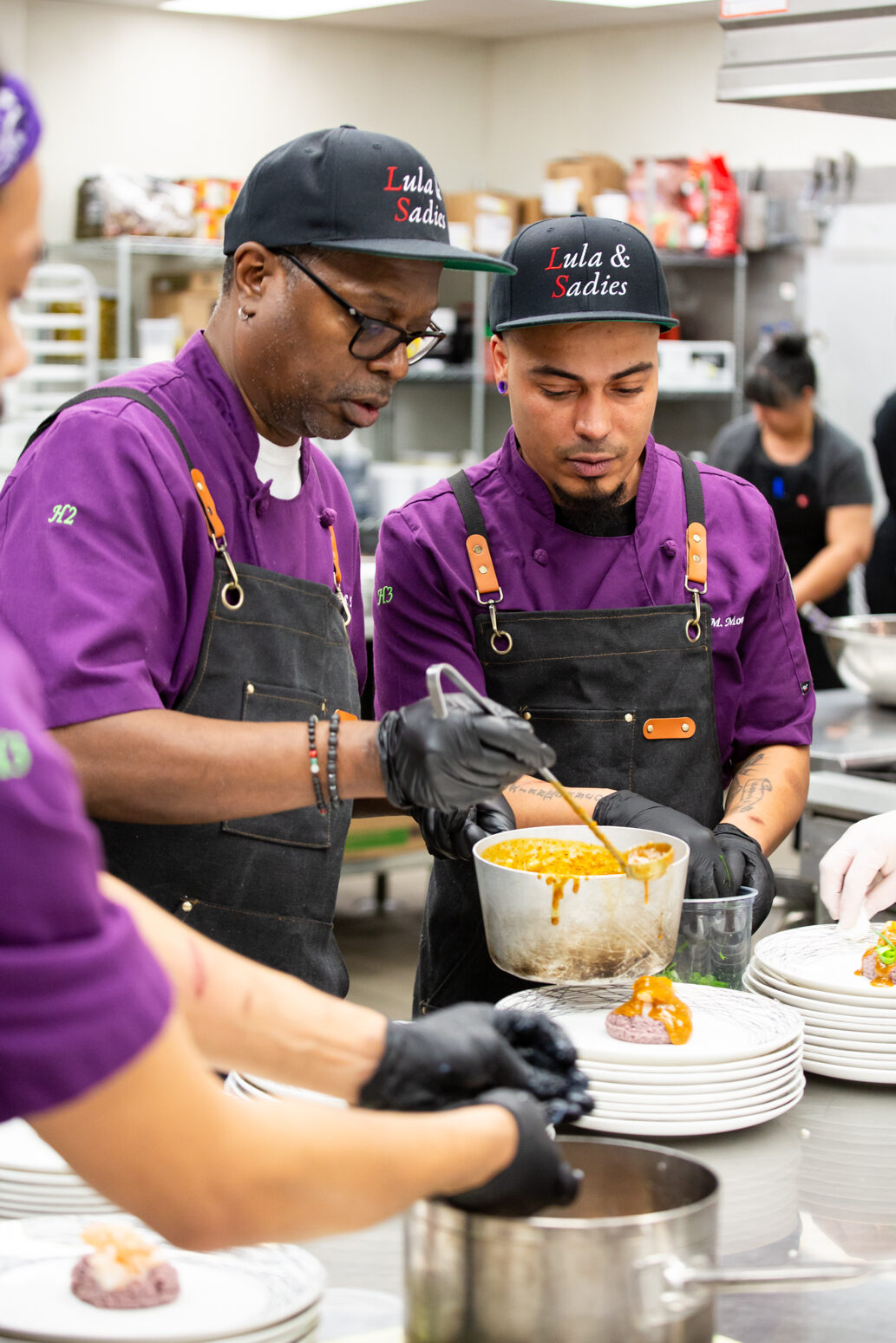 Lula&Sadies chefs preparing meals during cooking competition Cooking for the Kids at Millbrook Manor in Raleigh