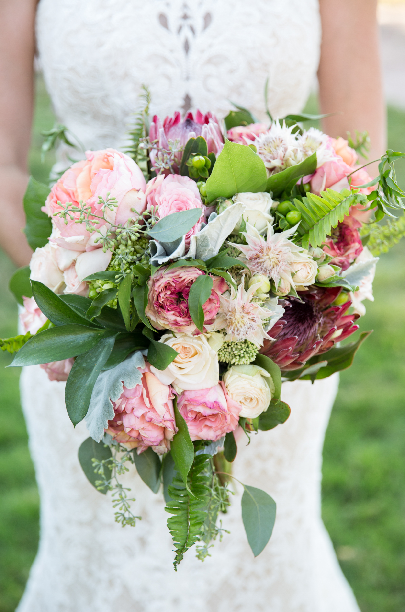 red and orange wedding bouquet 