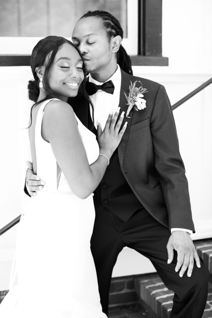 Outdoor portraits of bride and groom during a wedding at All Saints Chapel in Raleigh. Wedding Photographers in Raleigh, NC.