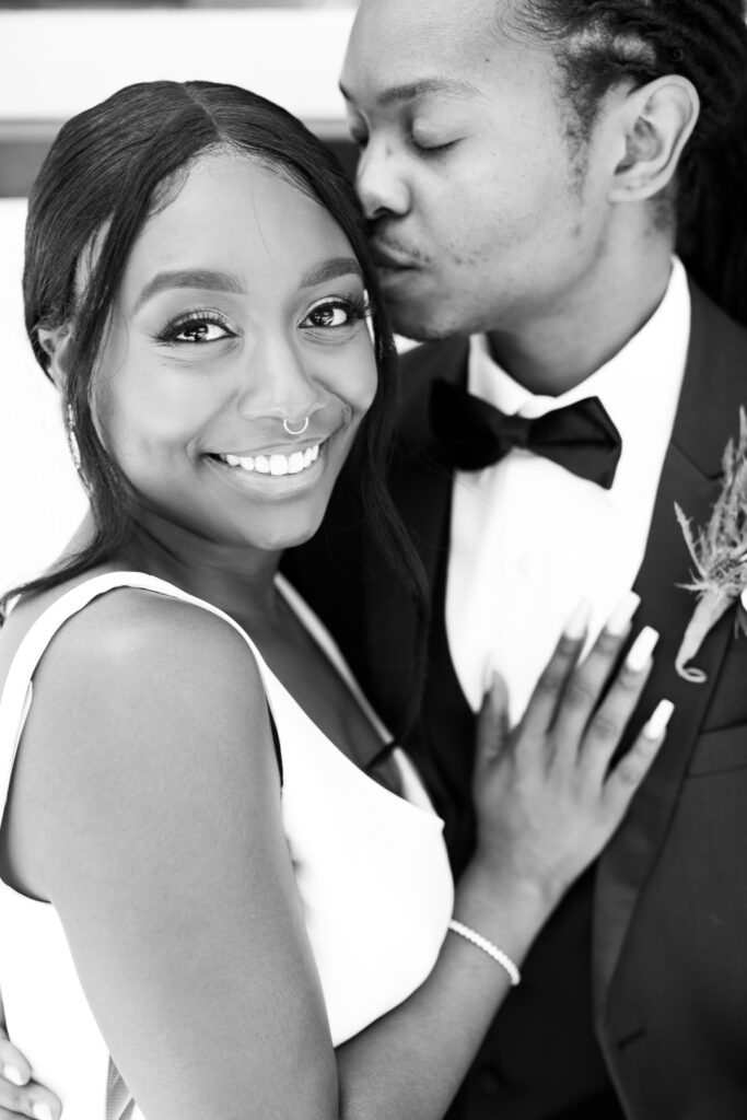 newlyweds portraits in front of All Saints Chapel in Raleigh