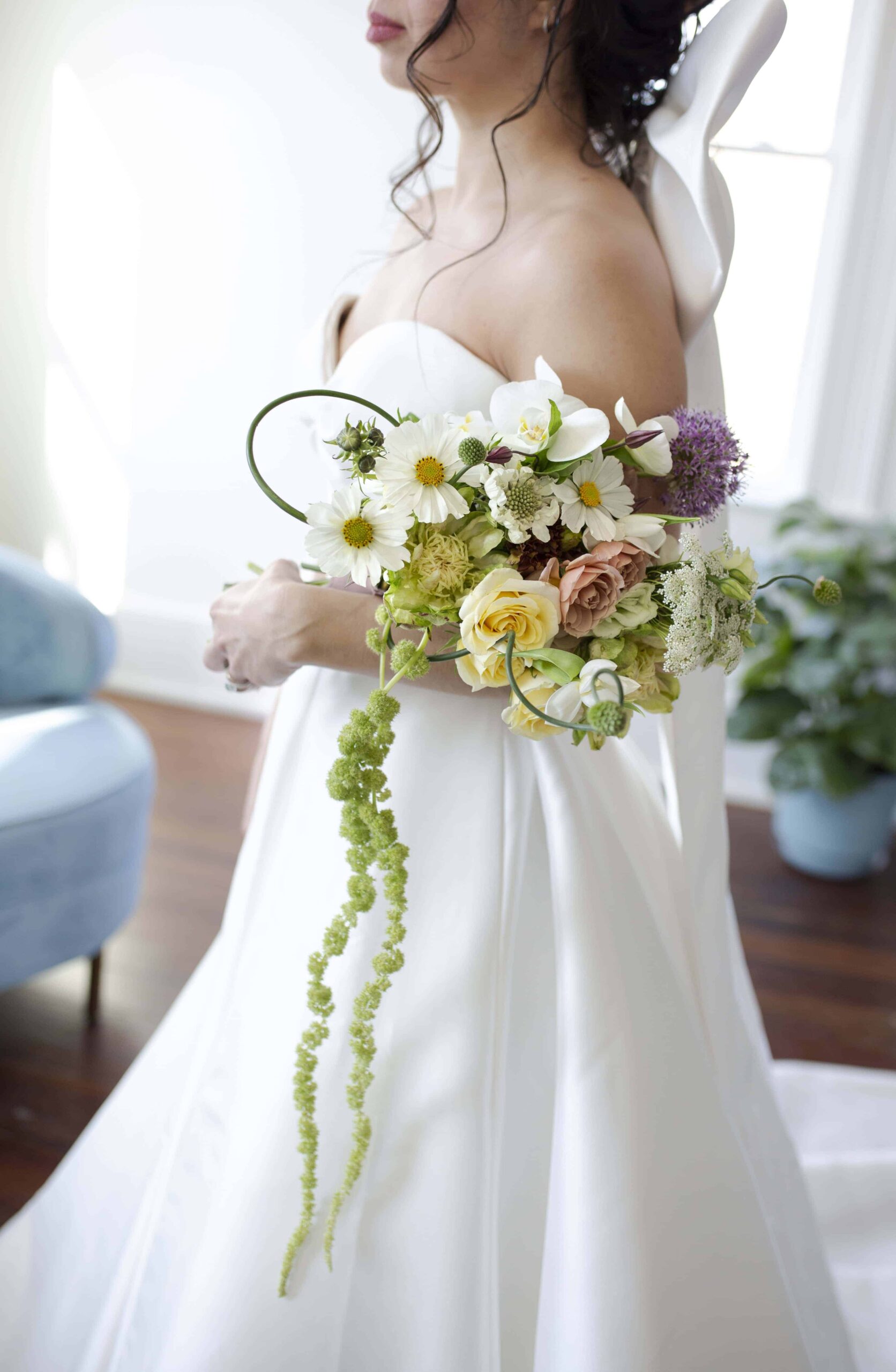 bride holding a wedding bouquet