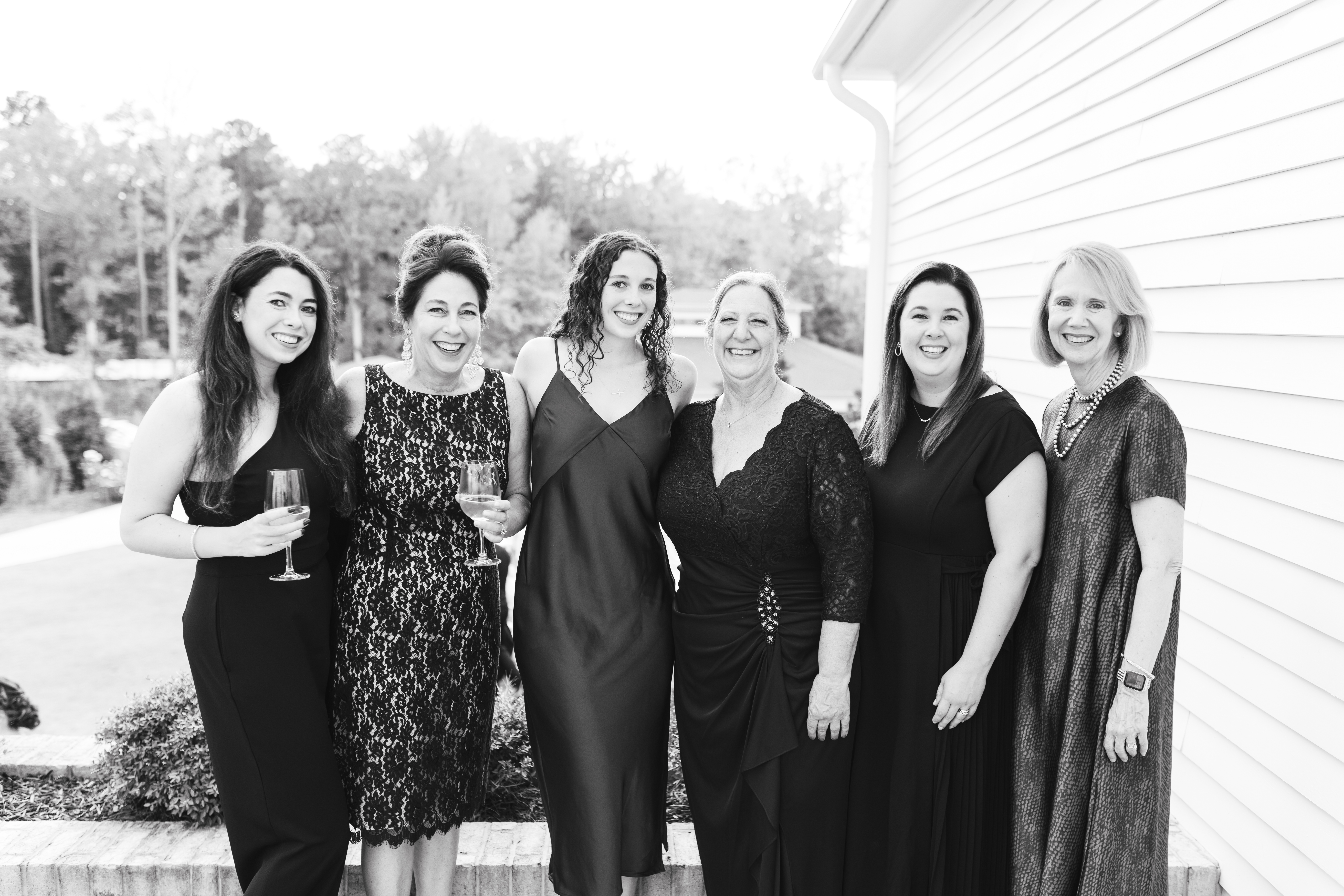 Mother of the bride with her sisters during cocktail hour at the Upchurch venue.