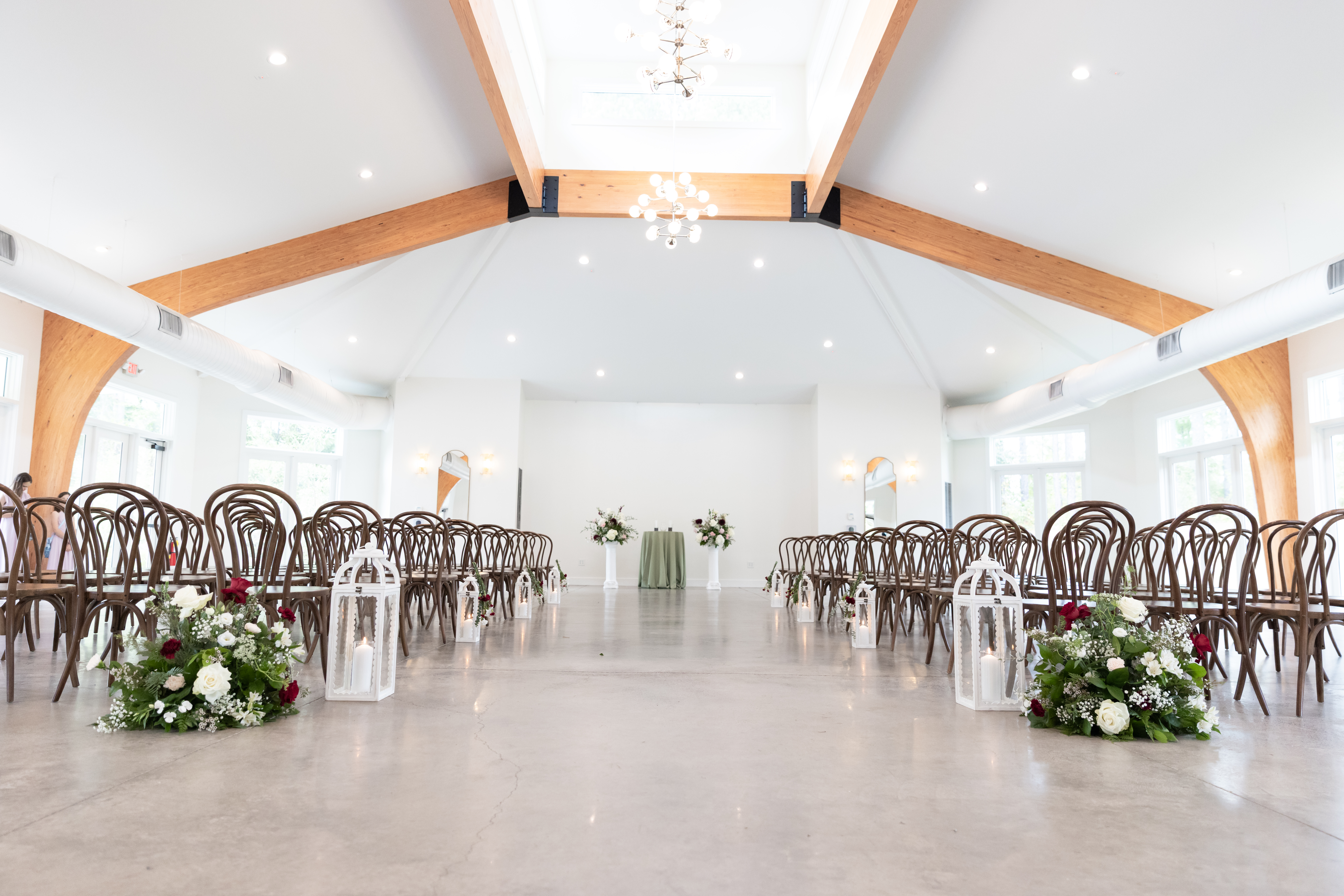Indoor ceremony setup at the Upchurch wedding venue in Cary, NC captured by Magdalena Stefanek Photography