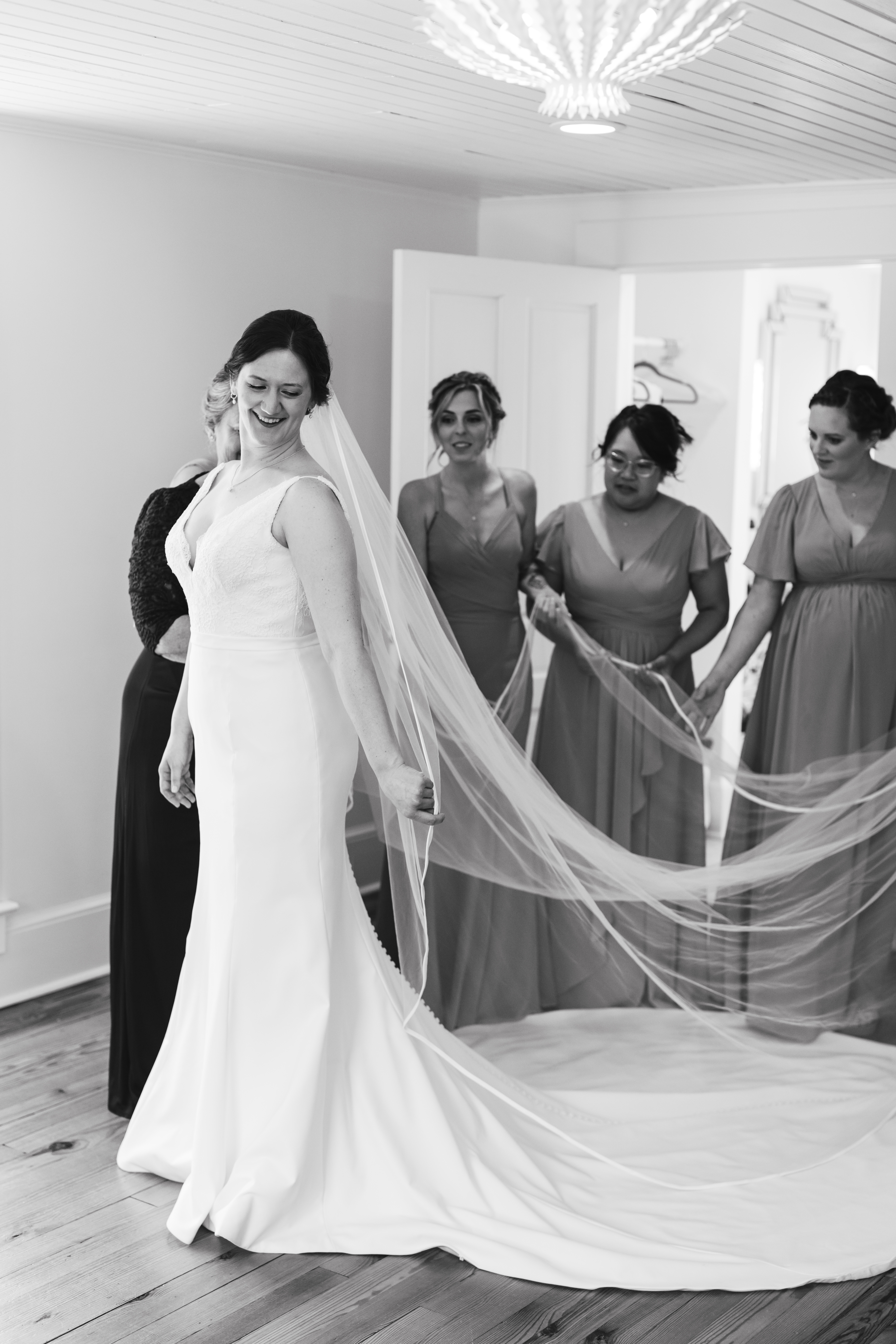 bride and her bridesmaids getting ready at the upchurch house