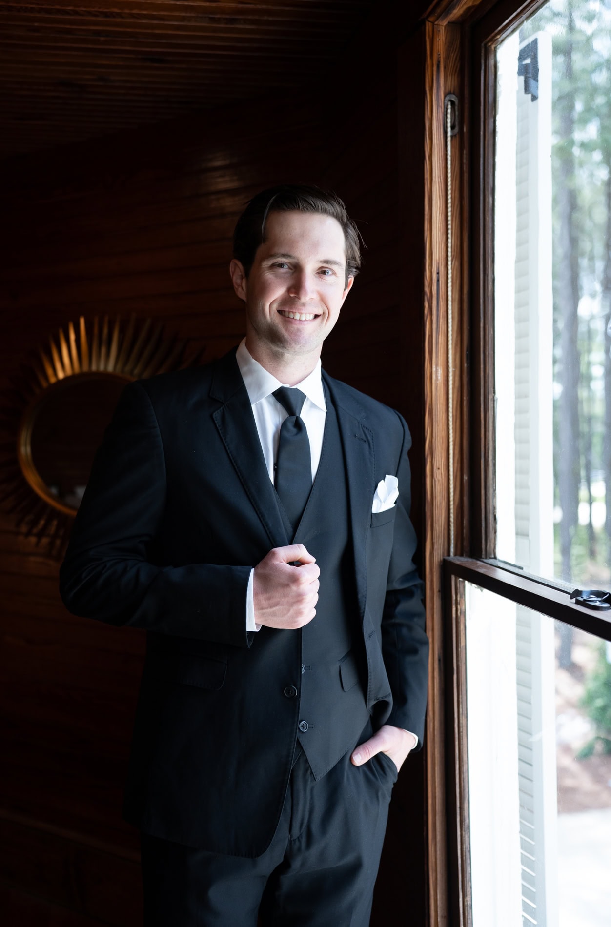 Groom portrait at the groom's getting ready suite at the Upchurch.