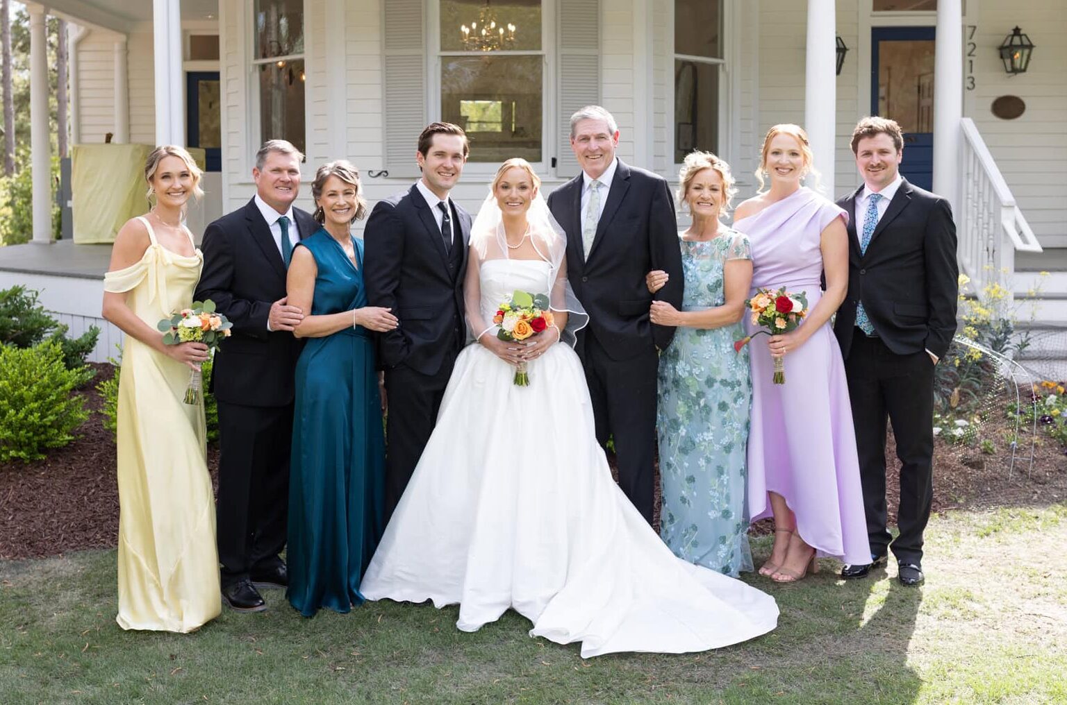 Formal family portraits in front of the upchurch