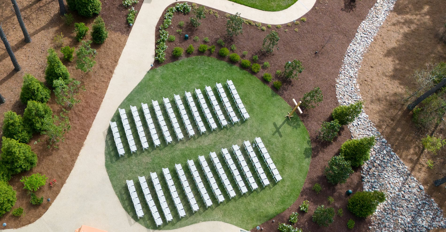 Aerial view of the ceremony site at the Upchurch wedding venue in Cary. Magnolia lawn capture by the upchurch wedding photographer -Magdalena Stefanek Photography.