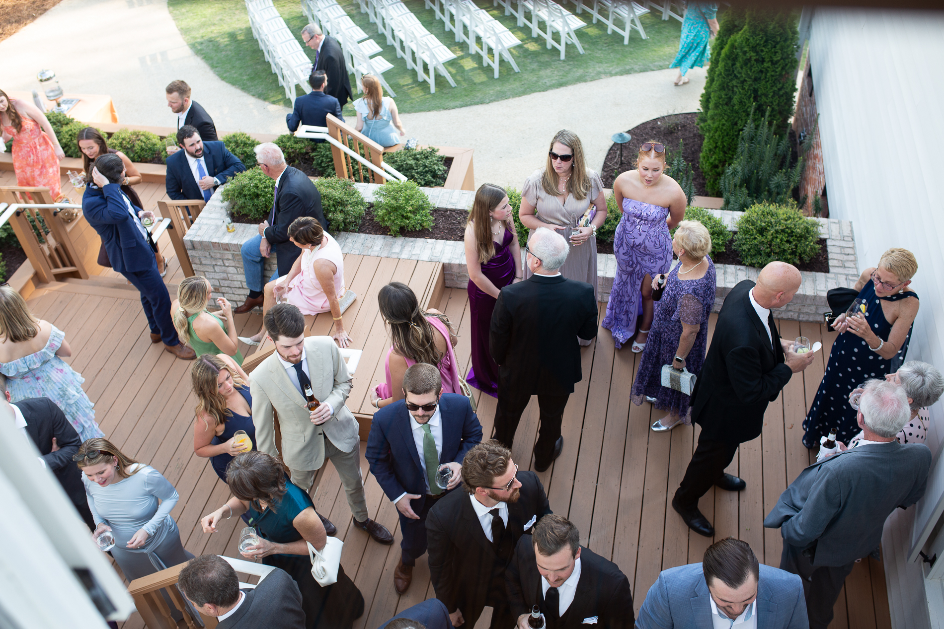 wedding guests mingling during cocktail hour at the upchurch venue