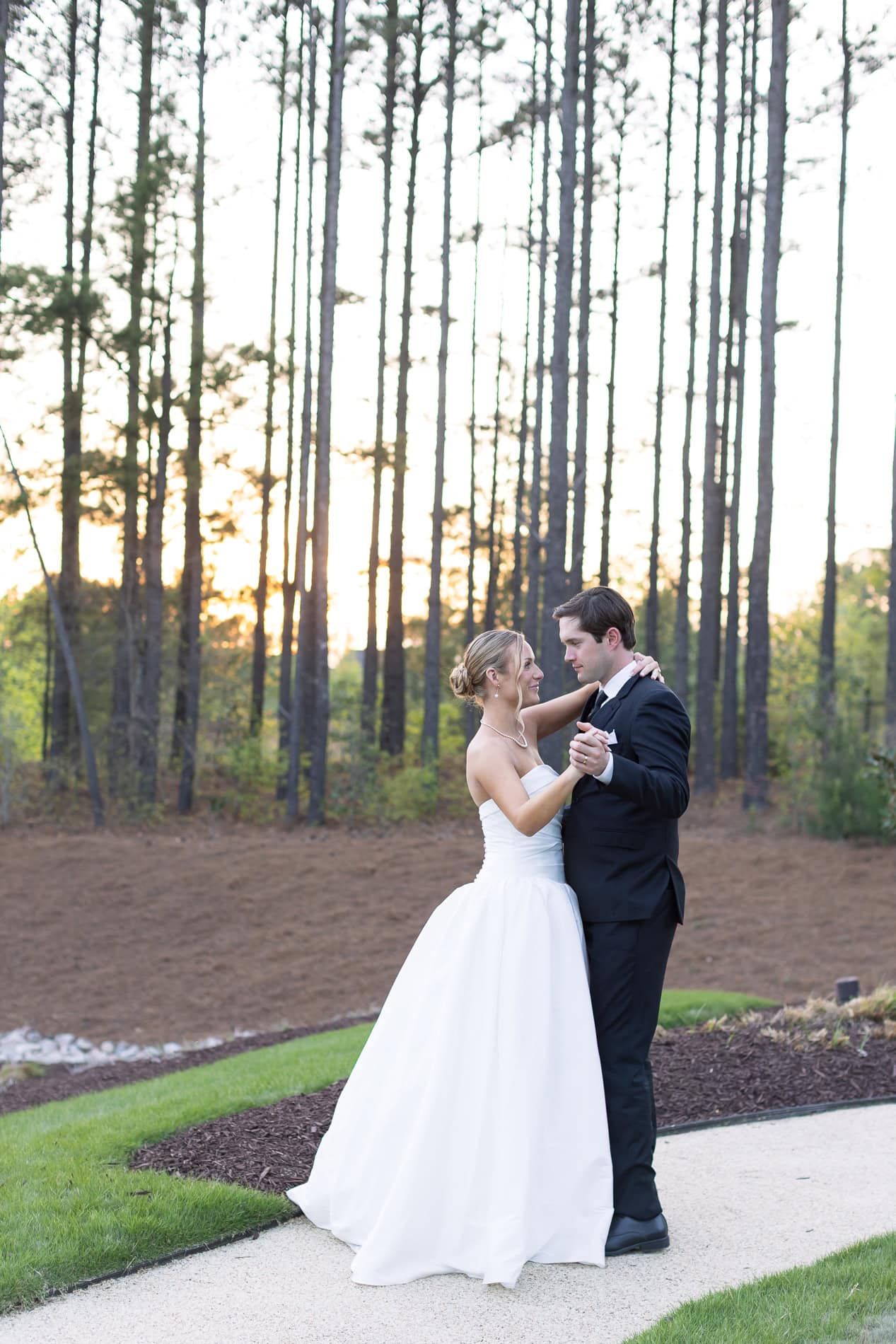 Golden hour portraits at the Upchurch wedding by Magdalena Stefanek Photography, a Raleigh wedding photographer.