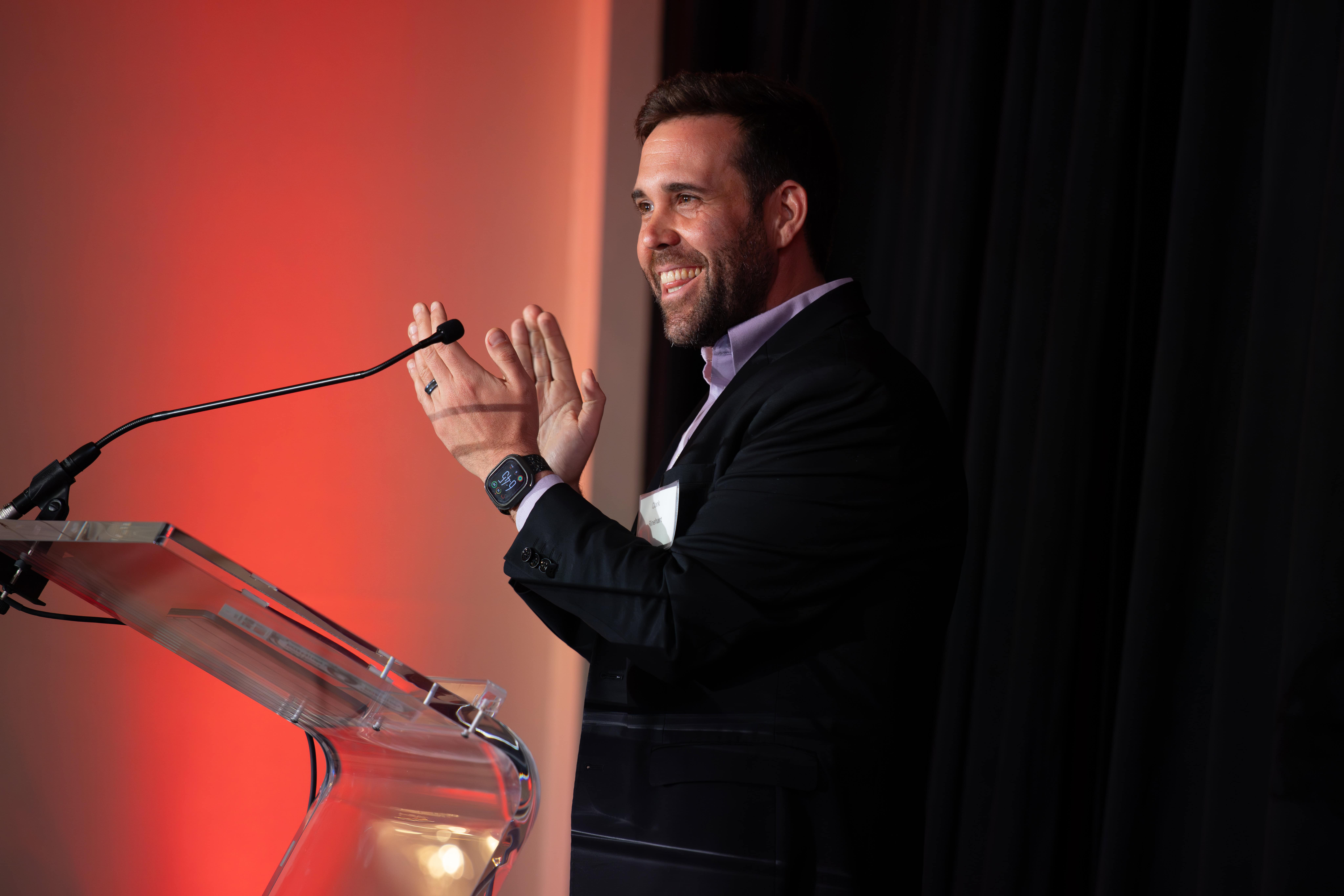 Keynote speaker during an event at North Ridge Country Club in Raleigh, NC. North Ridge Country Club in Raleigh, NC event photographer.