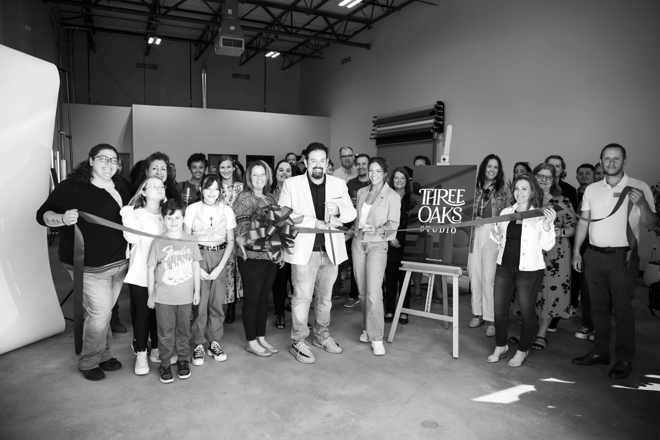 team photo during a company celebration/opening. raleigh corporate event photographer. 